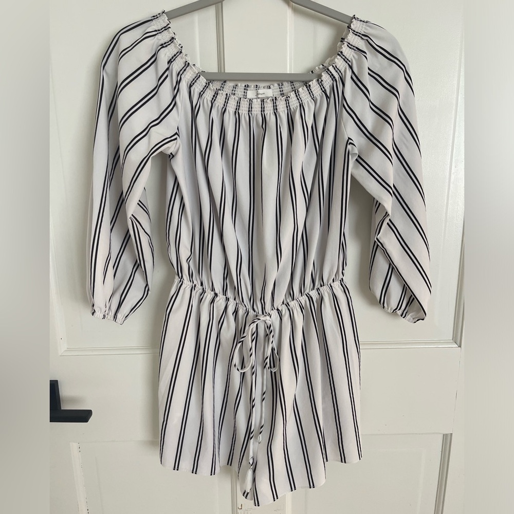 Black and white striped off the shoulder romper.